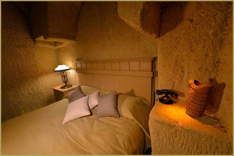 Deluxe Mağara Oda Grapes kaya oyma taş odası yatak