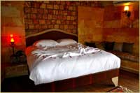 Superior Deluxe Stone Room Kuzey Honeymoon Room Bed in Cave Hotel Cappadocia